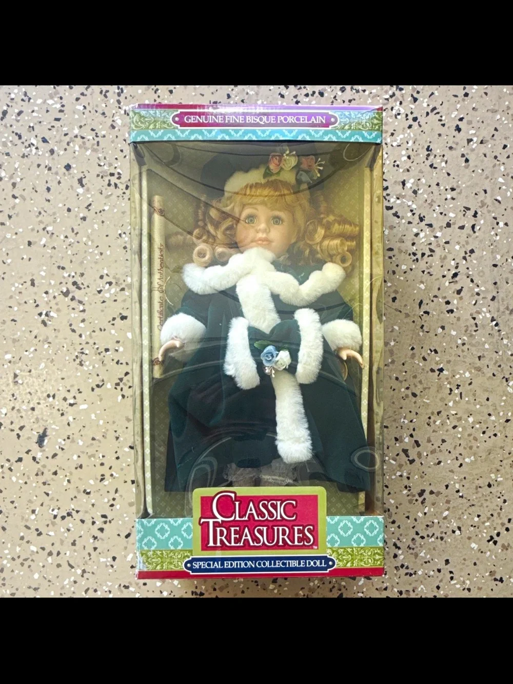 Classic Treasures Porcelain Doll in Dark Green Coat with White Trim